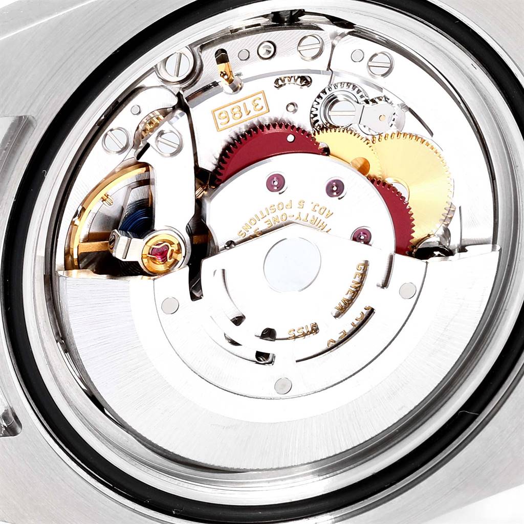 This image shows the intricate inner mechanisms and movement of the Rolex GMT-Master 116710 Men's Stainless Steel Black Dial 116710 Men's Stainless Steel Black Dial watch from a rear-angle view.