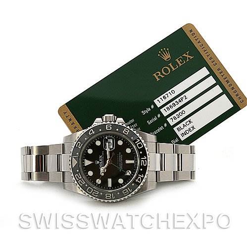 The image shows a top-front view of a Rolex GMT-Master 116710 Men's Stainless Steel Black Dial 116710 Men's Stainless Steel Black Dial watch along with its certification card.
