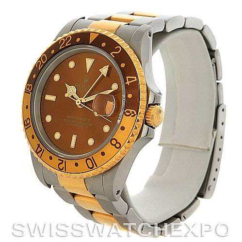 The Rolex GMT-Master 16713 Men's Stainless Steel Brown Dial 16713 Men's Stainless Steel Brown Dial watch is shown at a 3/4 angle, highlighting its face, bezel, crown, and two-tone band.