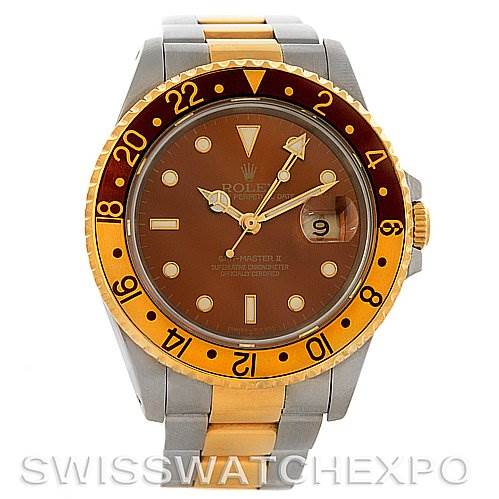 The Rolex GMT-Master 16713 Men's Stainless Steel Brown Dial 16713 Men's Stainless Steel Brown Dial watch is shown from the front, displaying its dial, bezel, hands, and part of the bracelet.