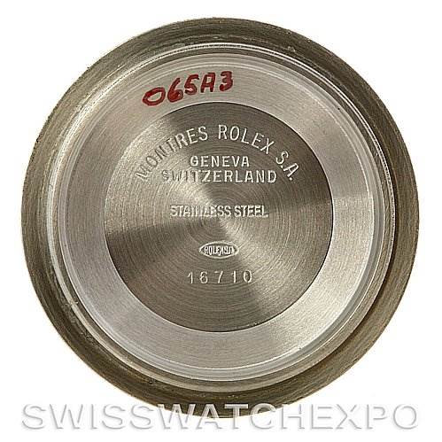 This image shows the back inside cover of a Rolex GMT-Master 16713 Men's Stainless Steel Brown Dial 16713 Men's Stainless Steel Brown Dial (model 16710) with engravings indicating its origin and material.