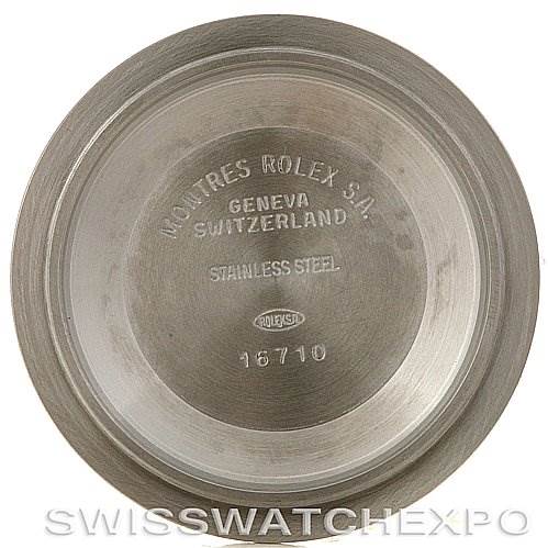 This image shows the inside case back of a Rolex GMT-Master 16713 Men's Stainless Steel Black Dial 16713 Men's Stainless Steel Black Dial, featuring engraved text and model number 16710.