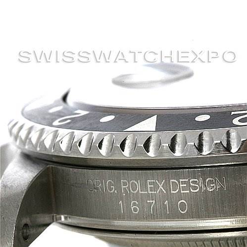This close-up angle shows the side of the Rolex GMT-Master 16710 Men's Stainless Steel Black Dial 16710 Men's Stainless Steel Black Dial watch case, bezel, and engraved model number 16710.