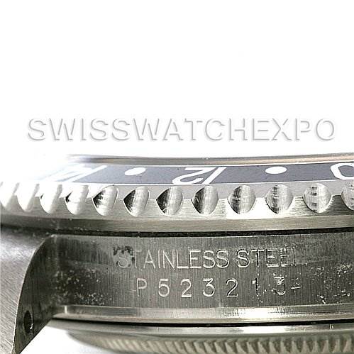 The image shows a side angle of the watch case and bezel with engraving details on the Rolex GMT-Master 16710 Men's Stainless Steel Black Dial 16710 Men's Stainless Steel Black Dial model.