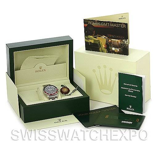 This image shows the Rolex GMT-Master 16710 Men
s Stainless Steel Black Dial 16710 Men
s Stainless Steel Black Dial watch at an angle, accompanied by its box, manuals, and accessories.