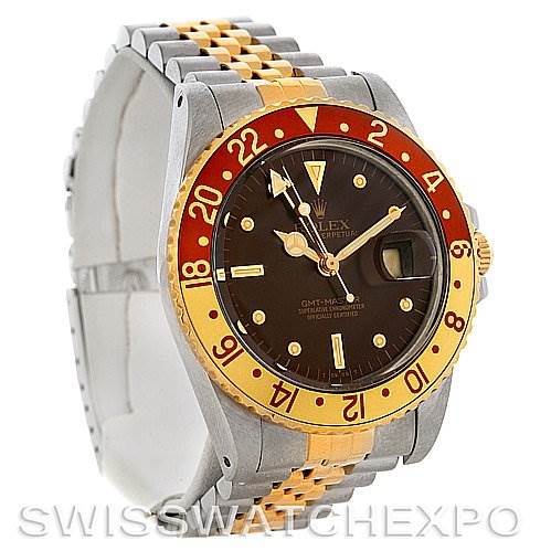 The image shows a Rolex GMT-Master 16753 Men
s Stainless Steel Brown Dial 16753 Men
s Stainless Steel Brown Dial watch from an angled side view, highlighting its two-tone bracelet, bezel, and dial.