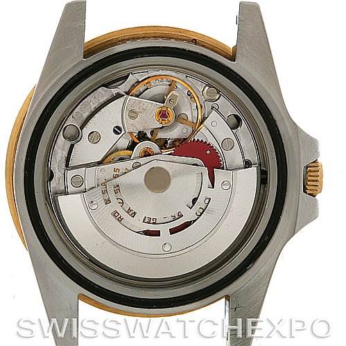 This image shows the movement and internal components of a Rolex GMT-Master 16753 Men
s Stainless Steel Brown Dial 16753 Men
s Stainless Steel Brown Dial watch from a case back angle.