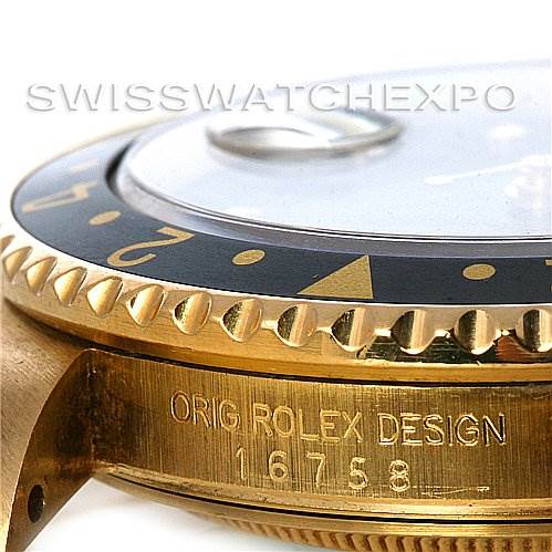 This image shows a close-up of the gold case, bezel, and part of the dial of a Rolex GMT-Master 16758 Men's Stainless Steel Black Dial 16758 Men's Stainless Steel Black Dial, model 16758.