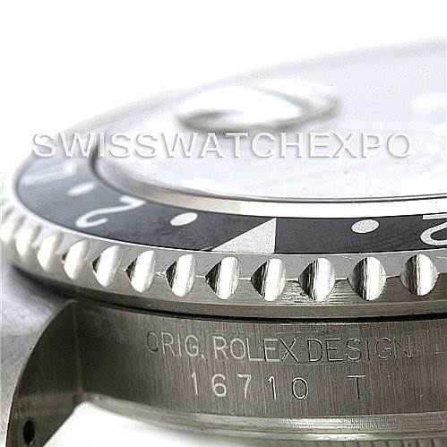 This close-up photo shows the side and partially the bezel of a Rolex GMT-Master 16710 T Men's Stainless Steel Black Dial 16710 T Men's Stainless Steel Black Dial, highlighting the model number 16710.