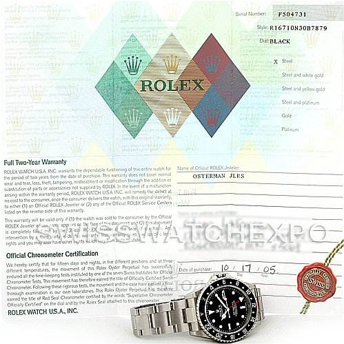 The image shows a Rolex GMT-Master 16710 T Men's Stainless Steel Black Dial 16710 T Men's Stainless Steel Black Dial watch, warranty card, certification paperwork, and part of the watch's bracelet.