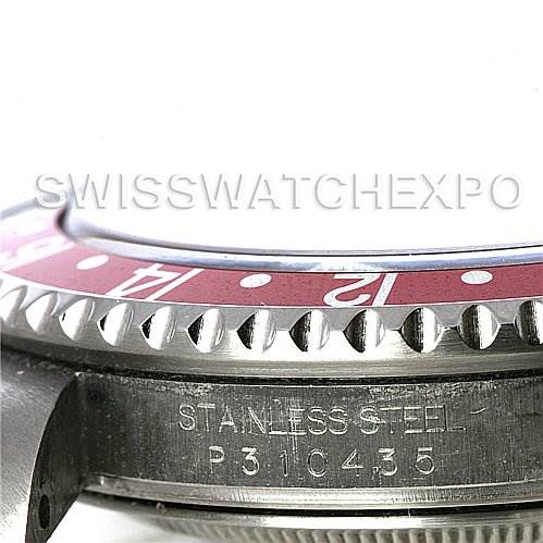 This close-up image shows the bezel and part of the case with the serial number of the Rolex GMT-Master 16710 Men's Stainless Steel Black Dial 16710 Men's Stainless Steel Black Dial watch.