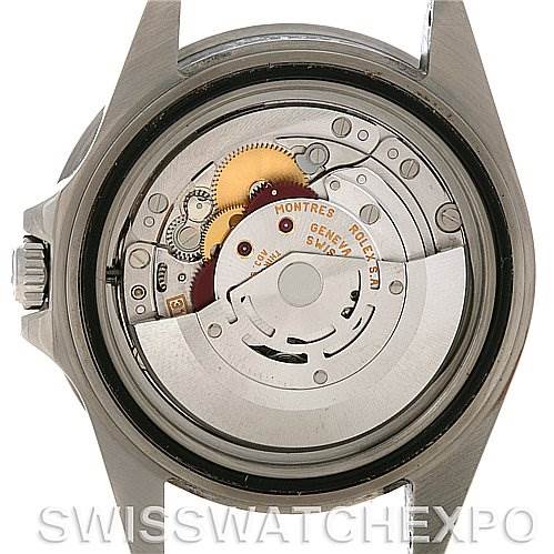 This image shows the internal movement of a Rolex GMT-Master 16710 Men's Stainless Steel Black Dial 16710 Men's Stainless Steel Black Dial watch from the back, revealing gears and mechanical components.