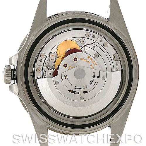 The image shows the open case back of a Rolex GMT-Master 16710 T Men's Stainless Steel Black Dial 16710 T Men's Stainless Steel Black Dial watch, revealing its internal mechanical movement.