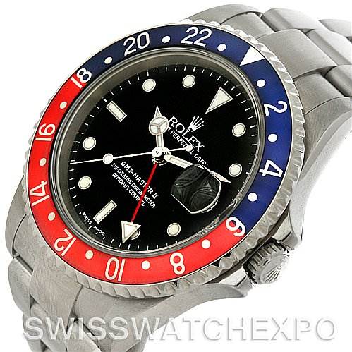 This image shows a Rolex GMT-Master 16710 Men's Stainless Steel Black Dial 16710 Men's Stainless Steel Black Dial watch with a Pepsi bezel, photographed at a slight angle displaying the dial, bezel, and bracelet.