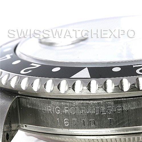 The image shows a close-up side angle of the bezel, crystal, and part of the case of a Rolex GMT-Master 16710 Men's Stainless Steel Black Dial 16710 Men's Stainless Steel Black Dial, model 16710.