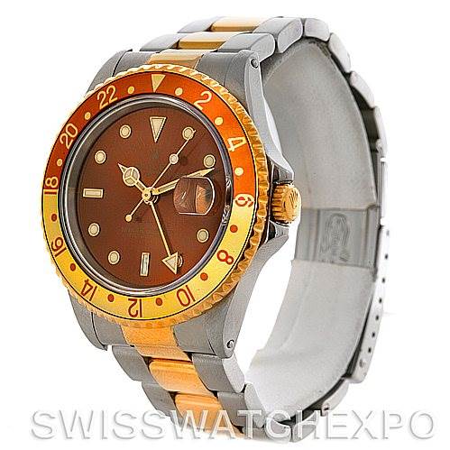 The image shows a Rolex GMT-Master 16713 Men
s Stainless Steel Brown Dial 16713 Men
s Stainless Steel Brown Dial watch at an angled front view, showcasing the dial, bezel, and part of the bracelet.