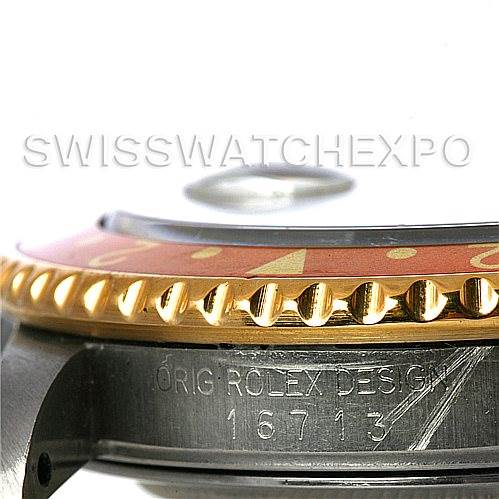 This image shows a close-up side angle of the bezel and case of a Rolex GMT-Master 16713 Men
s Stainless Steel Brown Dial 16713 Men
s Stainless Steel Brown Dial model, focusing on the model number and the brand
s engraved text.