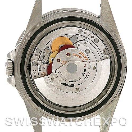 The image shows the internal movement of a Rolex GMT-Master 16710 Men's Stainless Steel Black Dial 16710 Men's Stainless Steel Black Dial watch seen from the back with its case removed.