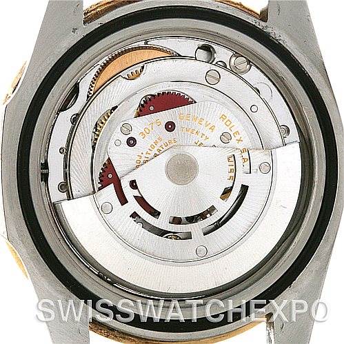 The image shows the internal movement mechanism of a Rolex GMT-Master 16753 Men's Stainless Steel Brown Dial 16753 Men's Stainless Steel Brown Dial watch from a rear angle, with the caseback removed.