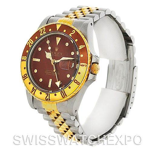 This is a Rolex GMT-Master 16753 Men's Stainless Steel Brown Dial 16753 Men's Stainless Steel Brown Dial watch shown from an angled side view, highlighting the face, bezel, and two-tone bracelet.