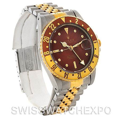 This image shows a Rolex GMT-Master 16753 Men's Stainless Steel Brown Dial 16753 Men's Stainless Steel Brown Dial watch from a three-quarter angle, displaying its bezel, dial, and two-tone bracelet.