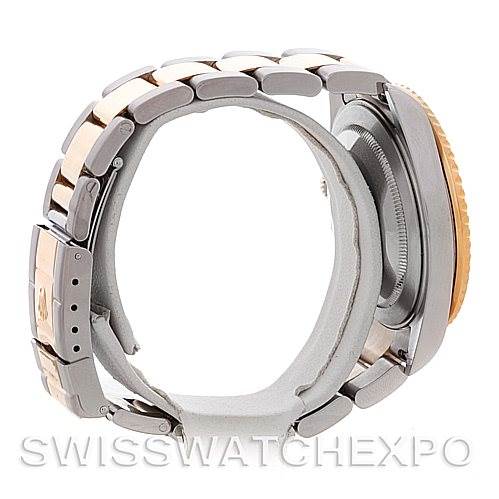 The image shows a side view of a Rolex GMT-Master 16713 Men's Stainless Steel Brown Dial 16713 Men's Stainless Steel Brown Dial watch, highlighting the bracelet and the case.