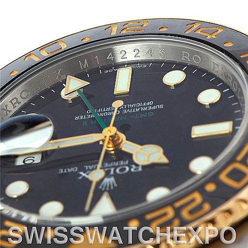The image shows a close-up angle of the Rolex GMT-Master 116713 Men's Stainless Steel Black Dial 116713 Men's Stainless Steel Black Dial watch face, focusing on the dial, hands, and part of the bezel.