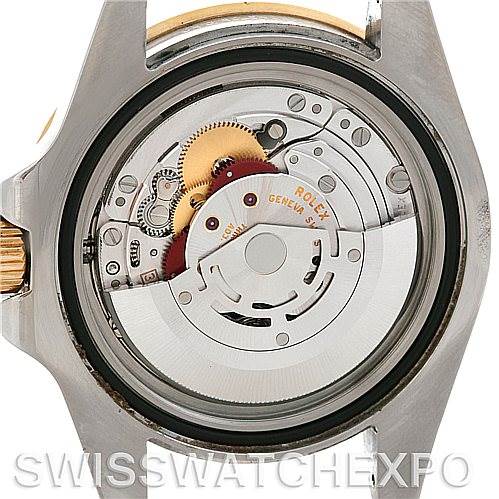 This image shows the movement mechanism of the Rolex GMT-Master 116713 Men's Stainless Steel Black Dial 116713 Men's Stainless Steel Black Dial watch from a back view.