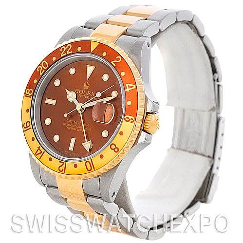 The image shows a Rolex GMT-Master 16713 Men's Stainless Steel Brown Dial 16713 Men's Stainless Steel Brown Dial watch from a three-quarter view, highlighting the bezel, dial, crown, and two-tone bracelet.