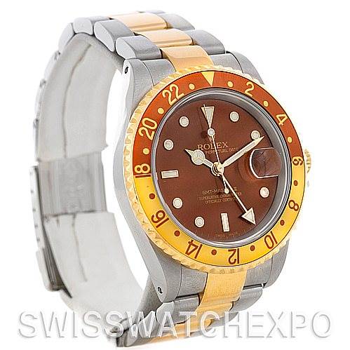 This image shows a Rolex GMT-Master 16713 Men's Stainless Steel Brown Dial 16713 Men's Stainless Steel Brown Dial watch, with a side and front angle, highlighting its brown dial and two-tone gold and stainless steel bracelet.