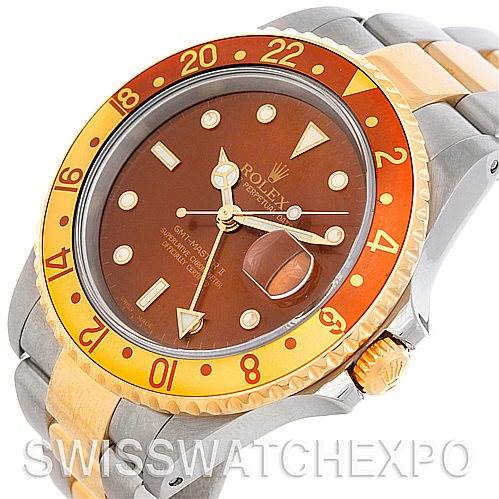 The image shows the face and bracelet of a GMT-Master model by Rolex at a slight oblique angle, highlighting the bezel and dial.