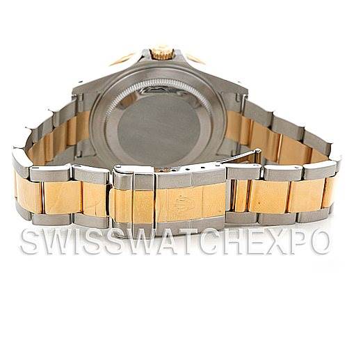 This image shows the back case and two-tone bracelet of a Rolex GMT-Master 16713 Men's Stainless Steel Brown Dial 16713 Men's Stainless Steel Brown Dial watch from a rear angle.