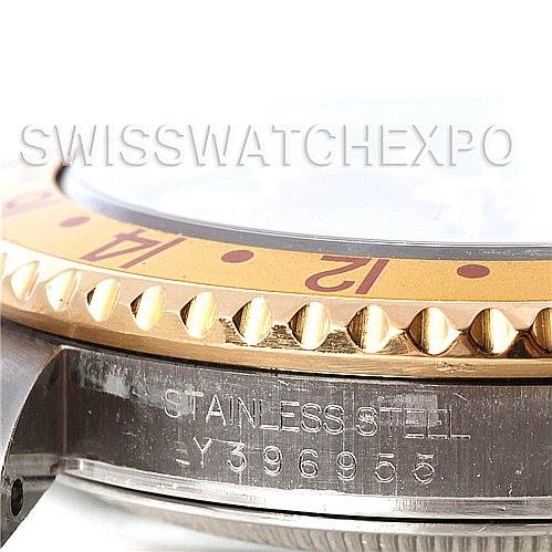 This image shows a close-up of the bezel and side of the case, including the serial number and "Stainless Steel" engraving on a Rolex GMT-Master 16713 Men's Stainless Steel Brown Dial 16713 Men's Stainless Steel Brown Dial watch.