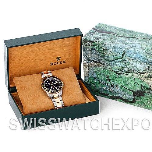 The image shows a Rolex GMT-Master 16713 Men's Stainless Steel Black Dial 16713 Men's Stainless Steel Black Dial watch in its open box, along with the outer Rolex Oyster packaging.