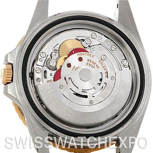 This image displays the back view of a Rolex GMT-Master 16713 Men's Stainless Steel Black Dial 16713 Men's Stainless Steel Black Dial watch, showcasing its internal movement and mechanisms.