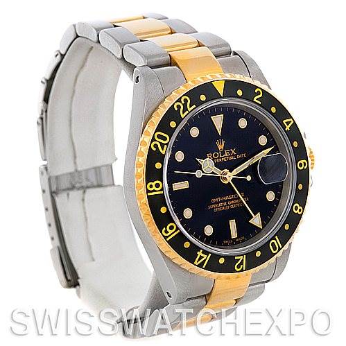 This image shows a side view of a Rolex GMT-Master 16713 Men's Stainless Steel Black Dial 16713 Men's Stainless Steel Black Dial watch, highlighting its bezel, dial, and two-tone metal bracelet.
