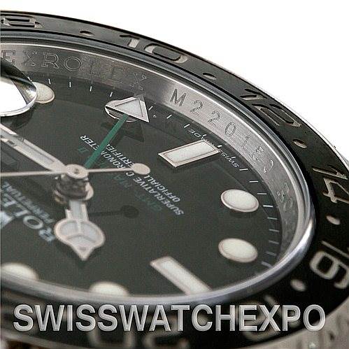 This close-up image showcases the dial and bezel of the Rolex GMT-Master 116710 Men's Stainless Steel Black Dial 116710 Men's Stainless Steel Black Dial watch.