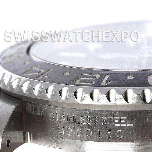 The image shows a close-up of the bezel, case, and serial number engraving on a Rolex GMT-Master 116710 Men's Stainless Steel Black Dial 116710 Men's Stainless Steel Black Dial watch.