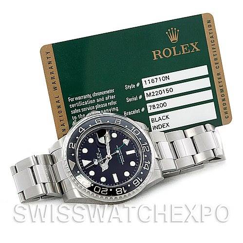 The image shows a Rolex GMT-Master 116710 Men's Stainless Steel Black Dial 116710 Men's Stainless Steel Black Dial watch laying flat with its bracelet visible and accompanied by a certification card.