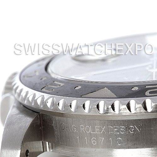This close-up angle of the Rolex GMT-Master 116710 Men's Stainless Steel Black Dial 116710 Men's Stainless Steel Black Dial watch shows the bezel, case, and part of the crown guard with the model number 116710 engraved.