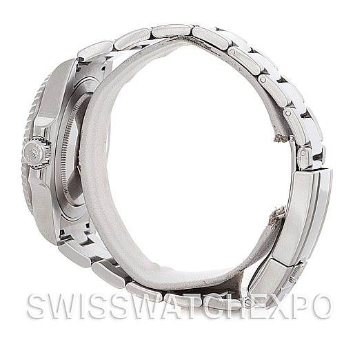 This side view of the Rolex GMT-Master 116710 Men's Stainless Steel Black Dial 116710 Men's Stainless Steel Black Dial watch shows the crown, case, and metal bracelet.