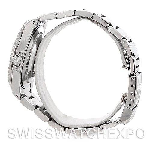 This side-angle photo of the Rolex GMT-Master 16710 Men
s Stainless Steel Black Dial 16710 Men
s Stainless Steel Black Dial watch showcases the case, bezel, and bracelet links.