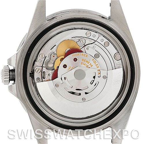 This image shows the open case back of a Rolex GMT-Master 16710 Men
s Stainless Steel Black Dial 16710 Men
s Stainless Steel Black Dial watch, revealing its internal movement and mechanics.