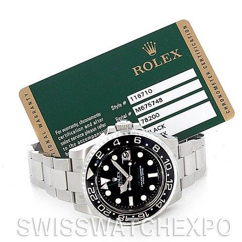 The Rolex GMT-Master 116710 Men's Stainless Steel Black Dial 116710 Men's Stainless Steel Black Dial watch is shown from a front angle with a green warranty card in the background.