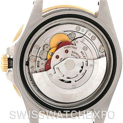 The image shows the inner mechanisms and movement of the Rolex GMT-Master 16713 Men's Stainless Steel Black Dial 16713 Men's Stainless Steel Black Dial watch from a back view.