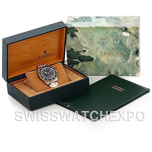 The image shows a Rolex GMT-Master 16713 Men's Stainless Steel Black Dial 16713 Men's Stainless Steel Black Dial watch in its open box, accompanied by a green booklet, and an outer Rolex-branded box.