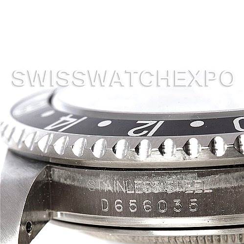 The image shows a close-up of the side view of the Rolex GMT-Master 16710 Men's Stainless Steel Black Dial 16710 Men's Stainless Steel Black Dial watch case, highlighting the bezel and serial number engraving.