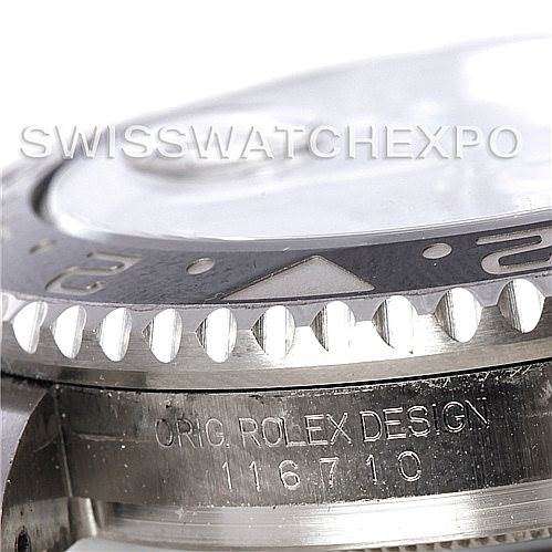 This close-up image of a Rolex GMT-Master 116710 Men's Stainless Steel Black Dial 116710 Men's Stainless Steel Black Dial watch shows the bezel and part of the casing with the model number 116710 engraved.