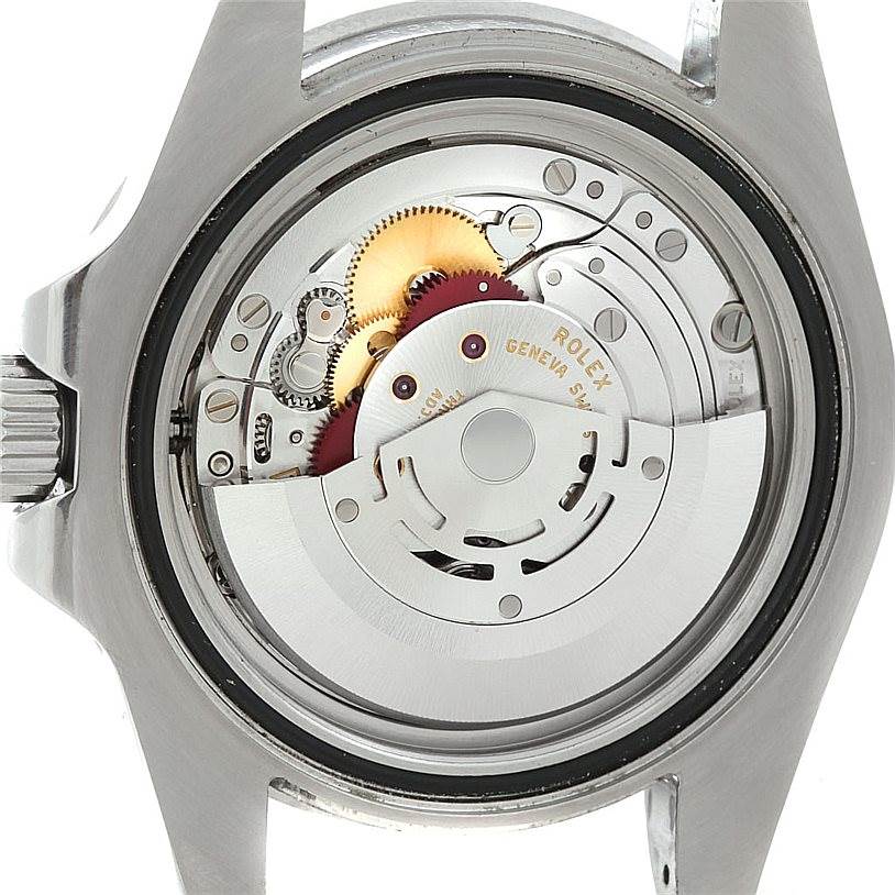 The image shows the internal mechanism and movement parts of a Rolex GMT-Master 116710 Men's Stainless Steel Black Dial 116710 Men's Stainless Steel Black Dial watch from the back view.