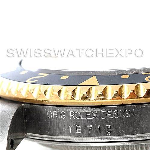 This image shows a close-up macro angle of the bezel and case of a Rolex GMT-Master 16713 Men's Stainless Steel Champagne Dial 16713 Men's Stainless Steel Champagne Dial, highlighting the "ORIG ROLEX DESIGN 16713" engraving.